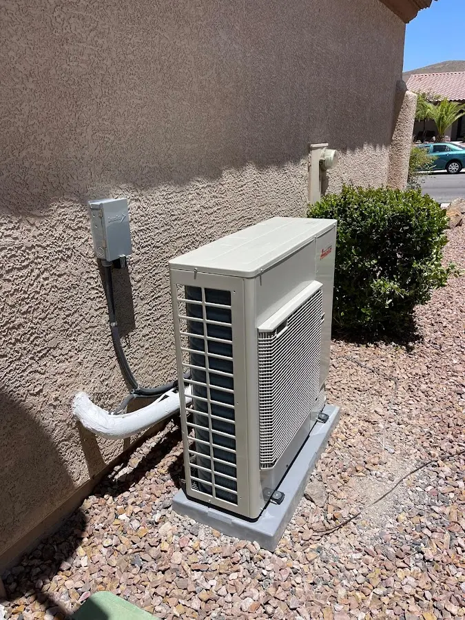 Residential air conditioning condenser unit in Freeport